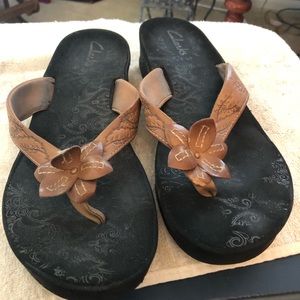 Clarks brand brown flip flop with wedge heel.  Size 10